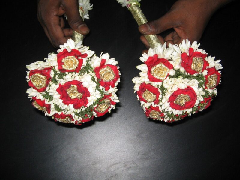 Lily ( Sampangi ) bouquet with red and gold