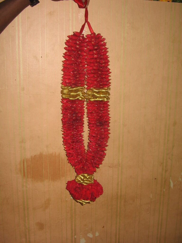 Red Rose petals garland with gold ribbon Balaji Flowers